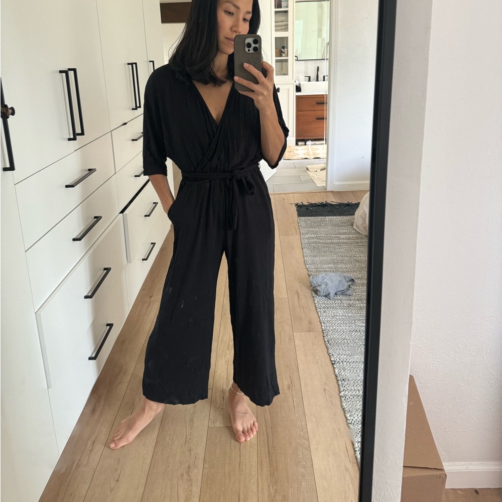Amour vert black jersey jumpsuit with belt tie